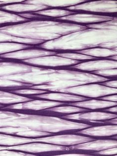 an image of water that is purple and white