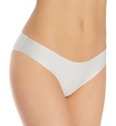 An ethereally light panty that is sure to become an everyday favorite. Made of nylon/cotton/elastane. Waist edge and leg openings have absolutely nothing sewn on to show under clothes. Silky microfiber knit feels heavenly soft against your skin. Sides are bonded. Four-way stretch moves any way you do. Low rise. Cheeky, seamless rear coverage. Tagless to help prevent irritation. Fully lined with bonded cotton crotch. Simone Perele Women's Uniq Bikini Panty in Ivory (10V720) | Size XL | HerRoom.co Simone Perele, Low Rise, Your Skin, Skin, Free Shipping, Clothes