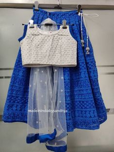 Product: Custom made girls kids dress. Fabric: Lehenga- Soft thread work net Top - embroidery silk Dupatta - embroidered net Delivery Time : Please let me Know if you are ordering for any special dates kindly inform me for any dates or times frame you keeping in mind. Blue Choli With Chikankari Embroidery For Diwali, Fitted Blue Lehenga With Chikankari Embroidery, Fitted Blue Chikankari Embroidery Lehenga, Festive Lace Work Lehenga For Navratri, Blue Lehenga With Chikankari Embroidery For Festivals, Blue Chikankari Embroidered Lehenga For Festivals, Navratri Anarkali Choli With Lace Work, Traditional Party Sets With Lace Work, Festive Choli With Lace Work And Traditional Drape