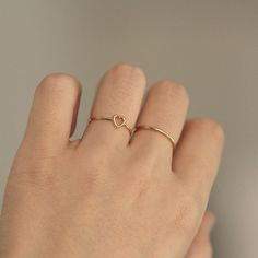 Heart Ring, 14K Solid Gold Open Heart Ring, 14K Wedding Ring, Engagement Ring, Minimalist Ring, 14K Solid Gold Ring, Promise Ring, Love Ring ≫ Product Details ◈ Handmade / Handcrafted Fine Jewelry ◈ Thickness: 1.2 mm ◈ Metal: Solid 14K Gold ◈ Gold Color: White gold, Rose gold, Yellow gold ≫ Please read our FAQ below for more detail. Dainty Gold Heart Ring For Promise, Dainty Heart Ring With Simple Design For Promise, Dainty Simple Design Heart Promise Ring, Minimalist Stackable Rings With Heart Charm For Promise, Minimalist Heart Shaped Stackable Promise Rings, Minimalist Heart Ring For Wedding, Minimalist Stackable Rings With Heart Charm For Anniversary, Simple Heart-shaped Stackable Promise Rings, Minimalist Stackable Heart Promise Ring