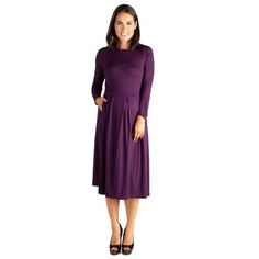 This classic, timeless style features an A-line skirt with large pleats, a round neckline, long sleeves, and midi length. The fit and flare maternity dress can be accessorized to match any personality or worn alone in its simplicity. The beautiful color options and fit make for a timeless look. Color: Purple. Gender: female. Age Group: adult. Fall A-line Midi Dress With Pleated Sleeves, Fall Midi Long Sleeve Dress With Pleated Sleeves, Fall Midi Length Long Sleeve Dress With Pleated Sleeves, Solid Pleated Midi Dress For Winter, Pleated Midi Dress For Fall, Fall Pleated Solid Midi Dress, A-line Midi Dress With Pleated Back, Fitted Pleated Long Sleeve Solid Dress, Classic Long Sleeve A-line Dress For Fall