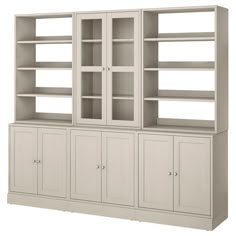 a white bookcase with two doors and three drawers