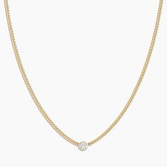 This necklace lends instant cool to any outfit thanks to an edgy 14k gold mini curb chain and shining round cut diamond. Customize the length of this adjustable necklace to fit any neckline. Product Details 0.115 total carat weight. One 3 mm genuine GH SI1 - SI2 diamond 14k solid gold 15" chain + 2" extender. Adjustable in 1" increments 15" - 17" 1.35 mm wide curb chain Spring ring closure | Diamond Wilder Necklace in 14k Gold, Women's by gorjana Gold Chain Link Necklace, Gorjana Jewelry, Black Labradorite, Orange Agate, Yellow Opal, Natural Weave, Iridescent Crystal, Pink Enamel, Blue Lace Agate