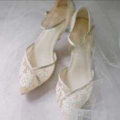 Bella Belle Size 7 Great Pre-Owned Condition, Some Wear To Bottom Sole Box Not Included Dust Bag Not Included Celia Lace D'orsay Nude Flats For Wedding Color: Nude Handmade Upper Material: Silk And Mesh Lining Material: Leather Lining Sole Material: Leather Sole Ankle Straps For A Secure Fit Wedding Bride Bridal Lace Feminine Elegant Rehearsal Dinner Engagement Photoshoot Formal Lace Wedding Shoes With Flat Heel, Fitted Flat Heel Wedding Shoes, Elegant Low Heel Lace Wedding Shoes, Elegant Lace Flat Heel Wedding Shoes, Elegant Flat Heel Wedding Shoes For Bride, Elegant White Flat Heel Wedding Shoes, Elegant Lace Wedding Shoes With Flat Heel, Elegant Lace Flat Wedding Shoes, Elegant Lace Wedding Shoes With Low Heel