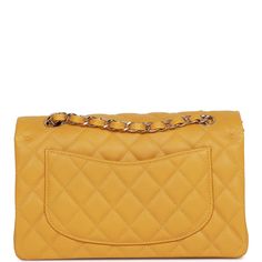 This Small Classic Double Flap bag is in yellow caviar leather with light gold tone hardware and features a front flap with signature CC turnlock closure, half moon back pocket, and adjustable interwoven light gold tone chain link and yellow leather shoulder strapDelivery 5-8 or 10-15 working days Please note that during high season and Sale period, delivery times may be affected We accept payment with a Credit card, Debit card, or PayPal.Note: Our Items are totally New High quality Brand Inspired Refurbished. Please make sure you are well aware of it before buying any of the Item. T&C's Apply in case of refunds.Please send us message on below chat to confirm availability. We will send the Refurbished Model in case you place an order with us. Enjoy Shopping.Always Send Us message to confir Modern Yellow Gold Bag With Gold-tone Hardware, Classic Gold Bag With Turn-lock Closure, Modern Gold Shoulder Bag With Turn-lock Closure, Gold Leather Bag With Turn-lock Closure, Elegant Gold Flap Bag With Turn-lock Closure, Gold Office Bag With Turn-lock Closure, Luxury Flap Bag With Cc Turnlock Closure For Travel, Luxury Double Flap Bag With Cc Turnlock Closure, Gold Shoulder Bag With Cc Turnlock Closure For Evening