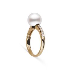 This 9.0-10. mm AAA quality White South Sea pearl ring showcases the pure organic beauty of elegant south sea pearl. The flawless pearl appears to float above the gold, yet is securely attached by a strong post. The classic-style ring features a solid 14-karat gold band that is set with 0.25 carats of diamonds. The ring setting is made in-house and is composed of solid 14 karat gold. We use an extra-fine diamond grade (VS1-G), which is normally reserved for solitaire settings. It's rare to see t Timeless White Akoya Pearl Ring, White Akoya Pearl Timeless Ring, Luxury Akoya Pearl Ring With Pearl Drop, Formal Akoya Pearl Ring In Fine Jewelry Style, Akoya Pearl Ring For Formal Occasions, Formal Akoya Pearl Fine Jewelry Ring, Timeless Yellow Gold Akoya Pearl Ring, Timeless Akoya Pearl Ring For Formal Occasions, Timeless Akoya Pearl Round Rings