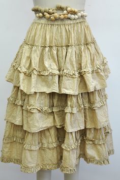 Dutton Skirt Cream Tiered Ruffled Skirt, Beige Ruffled Skirt Bottoms, Cream Ruffled Skirt, Cream Ruffled Skirted Bottoms, Cream Ruffled Flowy Bottoms, Flowy Beige Skirt With Ruffle Hem, Cream Long Ruffled Skirt, Cream Ruffled Long Skirt, Elegant Beige Ruffled Skirt