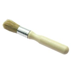 a close up of a brush on a white background