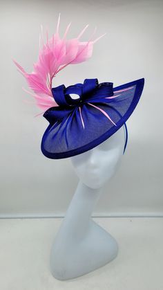 Elegant royal blue and PinkFascinator Classic style to go with a variety of outfits: bridesmaids,  cocktail party,  Kentucky Derby, Rehearsal dinner, Easter and church outfits.  Ones with hair clip and headband.  - Rare find - Lightweight  - Ready to ship - Fast Shipping - Free Shipping - Group discount available - Customize by adding different color flowers and or feathers - Headband and Hair clip  It comes in other colors see their links below: CHECK OUT MY STORE FOR OTHER STYLES & COLORS: etsy.com/shop/Hatsandpearls Find more at my website for more styles: www.hatsandpearls.com  Reach out to me if you can't find what you are looking for.  I can make cake custom orders and help you style and match your outfit  Tag and share your pictures when you wear and style our hats.  Instagram: @hat Elegant Carnival Hat Headpiece, Elegant Mini Hats For Wedding And Carnival, Adjustable Mini Hats For Royal Ascot Party, Kentucky Derby Party Hat With Pinched Crown, Adjustable Mini Hat For Kentucky Derby Party, Elegant Blue Mini Hat With Structured Crown, Adjustable Royal Ascot Costume Hats For Party, Party Fascinator With Short Brim For Royal Ascot, Blue Headband Fascinator For Kentucky Derby