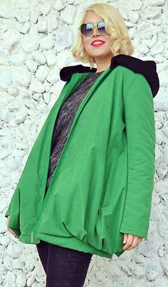 Green waterproof jacket made of taffeta and a knitted acrylic hoodie, perfect for spring. This wadded jacket is very comfortable and loose, being easy and fun to wear in rainy days or even sunny, yet chilly days of spring. We also have this design on black: https://www.etsy.com/listing/268552128/black-waterproof-jacket-casual-black Care instructions: Wash at 30 degrees The model in the picture is size S. Can be made in ALL SIZES. If you have any other specific requirements, do not hesitate to co Casual Windproof Hooded Jacket For Spring, Cotton Hooded Jacket For Cold Spring Weather, Spring Cotton Hooded Jacket For Cold Weather, Hooded Nylon Parka For Spring, Green Windbreaker For Fall Cold Weather, Green Parka For Spring Streetwear, Green Windbreaker For Cold Weather In Fall, Green Fall Windbreaker For Cold Weather, Trendy Hooded Nylon Outerwear