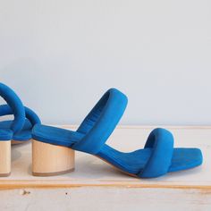 Bold And Minimal, Sofiya Is A Clean Two-Strap Sandal Slide. Each Strap Is Padded For Comfort And A Bit Of Drama, Which Complements The Delicate Silhouette. Heel Height 45mm (Approx. 1.7in). Made In Spain With A Lot Of Love And Integrity. This Style Runs Small. We Recommend Sizing Up. Blue Sandals With Low Stacked Heel, Blue Sandals With Wooden Heel For Spring, Blue Sandals With Wrapped Block Heel, Blue Open Toe Heels With Wooden Heel, Blue Block Heels With Heel Loop, Blue Sandals With Wooden Block Heel, Blue Low Heel Sandals With Removable Insole, Blue Block Heels With Wooden Heel, Blue Heels With Sculpted Heel For Spring