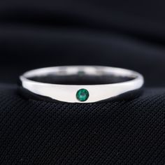 Product Details This Solitaire Band Ring is embellished with sparkling Round Cut Emerald set in the Flush Setting. This Mens Band Ring is composed in Gold, a beautiful jewelry. Product Information SKU SHP-RINGS092212136 Weight 2.80 gm (Approximate) EMERALD INFORMATION No.of Stones 1 Pieces Total Weight 0.05 Carat (Approximate) Dimension(approx) Round-2X2 mm-1 Pcs Color Green Cut Brilliant Shape Round Setting Type Flush-Setting Quality Grade AAA View More Product Parent Collection Handle emerald-women-wedding-bands Emerald Green Wedding Band, Green Wedding Band, Flush Setting, Emerald Wedding Band, Emerald Green Wedding, Solitaire Bands, Emerald Set, Wedding Band For Women, Mens Band Rings