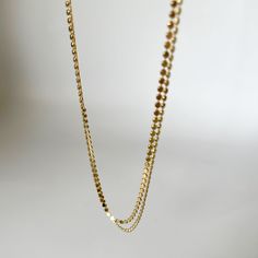 The Harlow Flat Ball Chain is the perfect layering chain. This chain adds a fun twist to your typical chain. Add a charm to the Harlow Flat Ball Chain to add a personalized touch! Product Details: 14K Gold-Filled Flat Ball Chain 16" & 18" Lengths Available Water-Wearable Made in Scottsdale, AZ Click here to buy an extender Model Specs: In Photo 2, Model is wearing 16" & 18" Harlow in on-body shot In Photo 4, Model is wearing 18" Harlow in on-body shot Dainty Necklaces With Double Chain And Chain Link, Dainty Double Chain Link Necklace, Double Strand Curb Chain Necklace, Gold Double Strand Curb Chain Necklace, Gold Double Strand Charm Necklace With Adjustable Chain, Dainty Double Strand Charm Necklaces, Dainty Double Strand Charm Necklace With Chain, Yellow Gold Double Strand Adjustable Chain Necklace, Double Strand Adjustable Chain Necklace In Yellow Gold