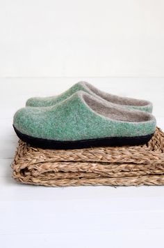 Felt warm women wool slippers green color mixed with natural beige color. Material that we use is high quality sheep's wool. Felt house slippers are felted using soap and warm water. No chemicals added. Soft slippers are warm comfy and cozy. Wool protects your feet from overheating so no sweat guaranteed. Give your feet some nice moments to relax with these hygge wool slippers. Slippers color is blush green mixed with natural no colored beige color. Sole: Suede leather (navy blue color). SOLE: T Green Cushioned Slippers With Round Toe, Green Cushioned Round Toe Slippers, Green Round Toe Slippers With Cushioned Footbed, Green Comfortable Slippers With Textured Footbed, Green Cushioned Flat Slippers, Green Flat Slippers With Textured Footbed, Green Comfortable Slippers With Round Toe, Comfortable Green Indoor Slippers, Green Flat Slippers With Rubber Sole