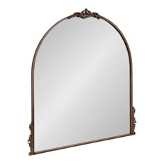 an ornate arched mirror on a white background