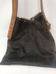 "Purchased in California at a swap meet, repurposed handmade bag used one time! strap is 1 1/4\"wide/strap drop 11\"/height 12\"/Length 11\"/smoke free environment/top closure two snaps(45)" Vintage Hobo Bag With Leather Backing For Travel, Vintage Rectangular Hobo Bag For Everyday, Vintage Everyday Hobo Bag Shaped As Satchel, Vintage Satchel Hobo Bag For Everyday, Rectangular Hobo Bag With Snap Closure For Everyday, Brown Retro Hobo Bag For Everyday Use, Vintage Hobo Satchel Bag For Everyday, Vintage Satchel With Adjustable Strap For Festival, Vintage Handmade Shoulder Bag For Everyday