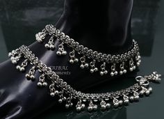 This is a gorgeous anklet you just look queen by wearing this , it is made from 925 sterling silver, gorgeous vintage antique stylish ankle feet bracelet, anklets. gorgeous ankle jewelry for belly dance wedding party tribal fabulous jewelry from Rajasthan India. Metal-925 sterling silver Item type-Anklets. length of anklet-10.5 INCHES Width-2.1 centimetre with bells. Weight-51 grams (Single weight) Finish-oxidized. STAMPED-925 Makes excellent gifting and collectable pieces. Traditional Wedding Jewelry For Summer, Traditional Summer Wedding Jewelry, Beaded Toe Ring Anklets For Festivals, Traditional Silver Anklets For Summer, Bohemian Anklets For Weddings And Festivals, Bohemian Anklets For Wedding And Festivals, Traditional Silver Beaded Wedding Anklets, Silver Bohemian Anklets For Festivals, Sterling Silver Toe Ring Anklet For Festivals