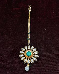 This is a beautiful Mangtikka, made with Kundan. This work well with all types of clothing, whether it be formal attire or a casual party. Eye-catching and unique jewellery that will set you apart. Gift this piece to a loved one, and see their face light up with joy. Best for gifting or for personal use, wear it to any occasion and be in the spotlight. Emerald Maang Tikka, Green Kundan Tikka For Celebration, Handmade Gold Kundan Tikka, Traditional Kundan Tikka, Green Tikka Jewelry, Face Light, Casual Party, Formal Attire, Gold Design