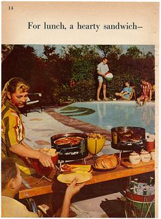 an advertisement for lunch, a hearty sandwich - filled picnic table by the pool