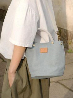 #handbag #canvas #blue #shoulderbag Japanese Canvas Bag, Casual On-the-go Shoulder Box Bag, Trendy Canvas Bucket Shoulder Bag, Trendy Bucket Canvas Bag For Daily Use, Casual Bucket Box Bag With Detachable Strap, Casual Crossbody Box Bag For On-the-go, Canvas Crossbody Bag With Removable Pouch For Shopping, Spring Satchel With Large Capacity For Everyday Use, Trendy Canvas Satchel For On-the-go