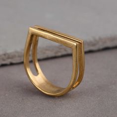 * Free Surprise Gift on Purchase of 1 Product. * Purchase of 4 Product and Get 2 Rings Free Gifts. Product :- Ring Material :- Brass Size :- All Size Available  Double Bar Ring, Modern Ring, Fashion Ring, Dainty ring, Statement Ring, Minimal Ring, 2 Line Ring, Gift For Her, Handmade Ring, Boho Ring * All our products are handmade and we make them as you see in the    photography but because of handmade There may be a slight difference in them * Handling Time: We take handling time of 1-3 Business Day from the date of receipt of the payment * Shipping Services: The shipping company takes 5-15 business days to deliver the product to US and most of other countries       For any queries Please feel free to message us. * Normally we respond in maximum 24 hours. * Gift packaging is available on Modern Brass Stackable Rings For Gift, Modern Brass Stackable Rings As Gift, Gold Bar Ring, Ring Minimal, Minimal Ring, Zierlicher Ring, Bar Ring, 2 Rings, Geometric Ring