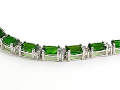 17.25ctw rectangular cushion green Russian chrome diopside with .63ctw round white zircon rhodium over sterling silver bracelet. Measures approximately 3/16"W. Hidden Box clasp with double safety. Modern Green Cubic Zirconia Jewelry, Rectangular Cushion, Green Chrome, Tsavorite Garnet, Box Clasp, Rare Gems, Broken Chain, Sterling Silver Bracelet, Gemstone Colors