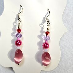 J76 Handmade Beaded Pink And Purple Dangle Earrings With Large Vintage Pink Beads This Is A Listing For A Live Show. Please Watch The Live Show For More Information. Pink Beaded Drop Crystal Earrings, Pink Beaded Crystal Drop Earrings, Pink Dangle Beaded Earrings With Spacer Beads, Purple Dangle Beaded Earrings With Spacer Beads, Pink Dangle Earrings With Faceted Beads, Handmade Pink Crystal Earrings With Round Beads, Purple Czech Glass Earrings With Dangling Beads, Pink Dangle Crystal Earrings With Faceted Beads, Purple Dangling Beads Crystal Drop Earrings