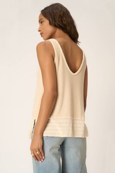 Only accepting weekend vibes moving forward.The Weekend Vibes Sweater Rib Tank is your new warm-weather BFF. It features a delicate knit fabric and a relaxed, long-line silhouette that is perfect for styling an easygoing look. A scoop neckline, side slits, and exposed seaming throughout add extra little details that will make this a style favorite this season. 46% Polyester45% Rayon7% Spandex Care Instructions: Machine wash cold. Wash inside out with similar colors. Do not bleach. Lay flat to dr V-neck Pointelle Knit Tops For Loungewear, Everyday Spring Sweater With Ribbed Neckline, Spring Everyday Sweater With Ribbed Neckline, Spring Sweater With Ribbed Neckline, Comfortable Everyday Tops With Soft Texture, Cozy Relaxed Fit Knit Top For Layering, Relaxed Fit Ribbed Top, Relaxed Ribbed Top For Fall, Relaxed Fit Spring Sweater For Layering