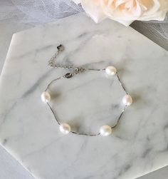 Classy and timeless, this glowing pearl bracelet can complete the most sophisticated of bridal looks. Excellent quality cultured pearls (10-11mm teardrop) are paired with sterling silver (marked 925) for a simple, but very elegant look. Length: 7.5" (approx. 19cm) with a 2" (approx. 5cm) extension chain for comfortable sizing. Closure is a secure spring ring clasp. Available in three beautiful colors: White, Blush and Mauve. To choose your desired color select from the dropdown menu. This beauti Bridal Accessories Belt, Wedding Pearl Jewelry, Hair Accessories Tiara, Flower Girl Jewelry, Light Mauve, Pearl Bridal Jewelry, Pearl Jewelry Wedding, Rose Gold Bridal, Color Wedding