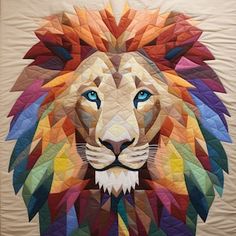 a quilt made to look like a lion's head with blue eyes and mane