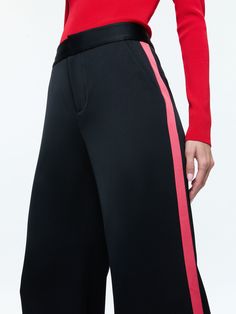 Dylan High Rise Wide Leg Pant With Racing Stripe Detail In Black/bright Ruby Wide Leg Bottoms With Side Stripes For Spring, Black Wide Leg Pants With Contrast Stripes, Black Wide-leg Pants With Contrast Stripes, Straight Pants With Contrast Stripes For Spring, Spring Wide Leg Bottoms With Contrast Trim, Sporty Wide Leg Pants For Spring Workwear, Sporty Wide-leg Pants For Spring Workwear, Wide Leg Bottoms With Contrast Trim For Work, Chic Pants With Contrast Stripes