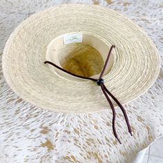 Hand woven fine palm hat. Brim measures 4”. Available in S/M or L/XL. 100% natural palm fiber is grown in warm coastal areas of Mexico and as a sustainable fiber is environmentally friendly. SPF 50 rating by California Polytechnic State University. Material: Hand woven palm sewn with double lock stickers. variations in color our weave are natural. Each hat is unique. Packing: Palm is very pliable and can be packed in a suitcase with articles of clothing stuffed in and around the crown. Re-Shapin Adjustable Natural Sun Hat With Flat Crown, Natural Woven Summer Hat Bands, Natural Woven Sun Hat For Rodeo, Handwoven Natural Color Sun Hat For Rodeo, Handwoven Natural Sun Hat For Rodeo, Eco-friendly Short Brim Straw Hat For Beach, Western Woven Sun Hat In Natural Color, Natural Woven Western Sun Hat, Western Style Woven Sun Hat In Natural Color