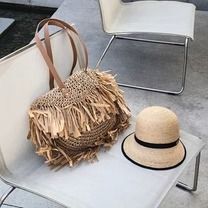 Semi-Circular Tassel Straw Tote Bag – 2YZ Shop Casual Brown Crochet Bag With Fringe, Casual Brown Straw Bag With Fringe, Casual Brown Straw Bag With Tassels, Casual Straw Bag With Tassels, Brown Tassel Shoulder Bag For Summer, Summer Brown Shoulder Bag With Tassels, Casual Summer Bags With Fringe, Casual Summer Fringe Bag, Trendy Beach Shoulder Bag With Tassels