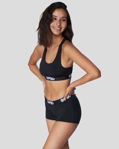 Racerback silhouette sports bra with lined front Breathable, ultralight, and soft to the touch polyester blend fabric Ultra-flexible 3.5cm microfiber blend band with moisture-wicking properties Hooters Outfit, Fitness Wear Women, Bra Size Guide, Sport Bra Top, Womens Bras, Black Sports Bra, Black Boys, Sports Bra Sizing, Shirt And Pants