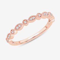 a rose gold wedding band with diamonds