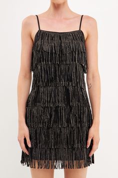 This suede mini dress is perfect for a night out on the town. With its sleeveless design, fringed detail, and embellished accents, this dress is sure to turn heads. Whether you're hitting up a club or going to a fancy dinner, this mini dress is a great choice. You'll look and feel fabulous in this amazing dress. Adjustable straps Fringe detail torso Mini length Sleeveless Lined Hand wash cold Do not bleach Do not tumble dry Do not dry clean Do not iron Shell: 50% Polyester 50% Polyurethane Lining: 100% Polyester Contrast: 100% Polyester Exclusive of Decoration JJ1827D Total length: 25.75" Bust: 33.50" S WINE: Height 5'9" / Bust 32" / Waist 25" / Hips 36.5" Black : Height 5'10" / Bust 32" / Waist 25" / Hip 35" Black Sparkly Fringe Dress, Suede Mini Dress, Fringe Mini Dress, Rhinestone Dress, Fancy Dinner, Fringe Dress, Black Fringe, Suede Fringe, Beaded Fringe