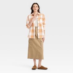 This Oversized Flannel Long-Sleeve Collared Button-Down Shirt from Universal Thread™ makes a versatile addition to your wardrobe. Made from midweight cotton, this collared shirt features a front button placket, long sleeves with buttoned cuffs, a patch pocket on the chest and a box-pleat back yoke for classic touches. The oversized fit and shirttail hemline complete the design, allowing you to wear it tucked in, untucked, layered open and unbuttoned, or with rolled-up sleeves. Universal Thread™: Relaxed Fit Flannel Shirt For Workwear In Fall, Spring Flannel Shirt With Button Closure For Work, Spring Flannel Shirt With Relaxed Fit, Spring Button Closure Flannel Shirt For Work, Spring Workwear Flannel Shirt With Button Closure, Spring Relaxed Fit Flannel Shirt With Button Closure, Relaxed Fit Flannel Shirt With Button Closure For Spring, Spring Workwear Flannel Button-up Shirt, Spring Casual Flannel Workwear Shirt