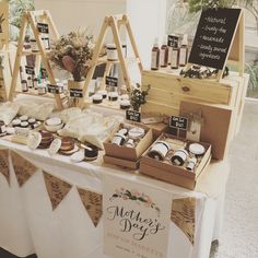 there are many items on the table for sale at this wedding reception, including donuts and pies