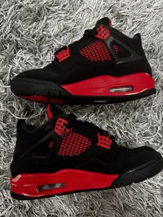 Elevate your sneaker game with these stylish Air Jordan 4 Retro Mid Red Thunder sneakers. Crafted with a mid-top shoe shaft style, these sneakers feature a striking black, multi-color, multi-color, and crimson colorway that is sure to turn heads. The style code, CT8527016, and release date, 20220116, add to the exclusivity of these sneakers. These sneakers are perfect for any athletic occasion and are designed with comfort in mind, making them an ideal choice for any active man. With a US shoe size of 4.5, these sneakers are a great fit for those with smaller feet. Don't miss out on the chance to own these stunning Air Jordan 4 Retro Mid Red Thunder sneakers. Shoes Cool Design, Red Quince Shoes Sneakers, J 4s, Red And Black 4s, Red And Black Jordan 4, Cute Red And Black Outfits, Nike Retro 4, Jordans For Boys, Red And Black Outfits Men