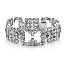 Experience the epitome of elegance with our Platinum 45 carat Diamond Vintage Bracelet. This exquisite piece of jewelry is a testament to timeless beauty and unparalleled craftsmanship. Indulging and scintillating, it boasts a remarkable 45 carats of round, baguette, and French cut diamonds meticulously set in lustrous platinum.As you adorn your wrist with this luxurious masterpiece, you'll be captivated by the dazzling symphony of light that emanates from the meticulously arranged diamonds. Eve Luxury Platinum Baguette Cut Bracelets, Luxury Baguette Cut Diamond Bracelet, Luxury Platinum Bracelets With Baguette Cut, Luxury Vintage Diamond Cut Diamond Bracelet, Vintage Diamond Bracelet, French Cut, The Dazzling, Vintage Bracelet, Platinum Metal