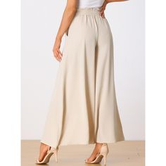 The wide-leg beach pants feature a drawstring waist, a tassel tie, and two side pockets, which are great for a perfect summer look. The soft fabric of the pants is drapey, even in the summer. It is not stuffy, showing elegant charm while relaxing. These fashionable and casual pants are perfect for spring, summer, and fall. Pair them with sandals or a hat for a glamorous look! Trousers Women Wide Leg, Wide Leg Palazzo Pants, Flowy Pants, Beach Pants, Ladies Of London, Straight Leg Trousers, Boho Women, Bottom Clothes, Women's Casual