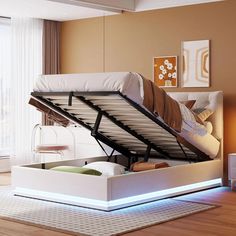 a bed that is sitting in the middle of a room with a light underneath it