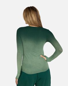 Made in LA 95% Siro Viscose 5% Spandex Wash Cold, Lay Flat to Dry ML Signature Soft Rib Knit Fabric Thumbhole Cutouts Fitted Silhouette Reactive Dye Stretch Fit Model & Fit Info Modeled in Size S Fitted Tee, Size Up If Unsure Height: 5' 9" / Waist: 23" / Bust: 31" / Hip: 34" Stretch V-neck Tops With Thumbholes, Green Fitted Long Sleeve T-shirt, Green Stretch Long Sleeve Knit Top, Stretch Tops With Thumbholes For Fall, Fitted V-neck Top For Layering, Fitted Long Sleeve Modal Top, Fitted Modal Long Sleeve Tops, Seamless Long Sleeve Summer Tops, Seamless Long Sleeve Tops For Summer