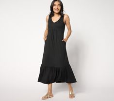 Stay stylish yet well within your comfort zone even when the temps are rising. Cool, casual, and carefree, this maxi dress makes the most-wanted list for relaxing stay-cations, beachy vacays, and weekend getaways. From Cuddl Duds. V-neck Maxi Dress For Beach Season Loungewear, Relaxed Fit V-neck Maxi Dress For Vacation, Spring Black Maxi Dress For Loungewear, Black Maxi Dress For Spring Loungewear, Breezy Spring Loungewear Maxi Dress, Breezy Spring Maxi Dress For Loungewear, Breezy Maxi Dress For Loungewear, Breezy Maxi Length Dress For Loungewear, Breezy Maxi Dress For Spring Loungewear