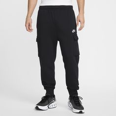 The Nike Sportswear Club Fleece Cargo Pants put an athletic spin on the classic cargo style. Made from soft brushed fabric, they're comfortable for all-day wear. Sporty Cargo Pants With Ribbed Cuffs For Streetwear, Nike Athleisure Cargo Pants With Cargo Pockets, Nike Cargo Pants With Cargo Pockets Athleisure Style, Nike Cargo Pants With Side Pockets For Sports, Nike Sporty Cargo Pants With Pockets, Nike Sporty Cargo Pants, Black Sports Sweats With Pockets, Black Sweats With Pockets For Sports, Nike Functional Cargo Pants With Pockets