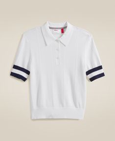 Essex Polo | Wilson Sporting Goods White Fitted Tops With Ribbing, Fitted White Tops With Ribbing, White Fitted Top With Ribbing, Sporty Fitted Top With Ribbed Neckline, White Tops With Ribbed Waistband For Spring, Collegiate Spring Tops With Ribbed Cuffs, Collegiate Style Top With Ribbed Cuffs For Spring, Spring Collegiate Tops With Ribbed Cuffs, Sporty Tops With Ribbed Waistband