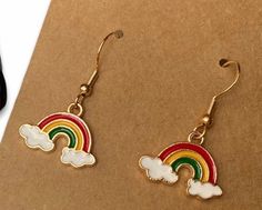 Fantastic Rainbow Earrings 925 silver ear hooks with rainbow charm The charm is alloy with enamel Rainbow Earrings, Lgbtq Pride, Ear Hook, Jewelry Earrings Dangle, 925 Silver, Dangle Drop Earrings, Dangle Earrings, Jewelry Earrings, 925 Sterling Silver