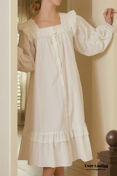 Indulge in timeless elegance with our Cottage Ruffle Lace Nightgown Dress. Crafted with delicate lace and adorned with charming ruffles, this nightgown exudes a romantic and feminine allure. The flowing silhouette offers comfort and freedom of movement, perfect for lounging in style or enjoying a peaceful night's sleep. Elevate your bedtime routine with this enchanting nightgown that combines classic beauty with modern comfort. Features: 100% Cotton Relax Fit Breathable (great for all seasons) M Dress Pajamas Nightgowns, Victorian Style Nightgown, Silky Nightgown Aesthetic, Vintage Sleeping Gown, Soft White Dress, White Night Dress Sleep, Cottage Core Nightgown, Vintage Style Nightgown, White Dress With Ruffles