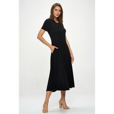 Our Jenesis T-Shirt Dress is perfect for both casual and dressier occasions with its relaxed yet flattering silhouette. Whether you're heading out for a casual brunch date or running errands, this short sleeve t-shirt midi dress with pockets is your go-to choice. Pair it with sneakers or sandals for a laid-back look or dress it up with heels and accessories for a more sophisticated ensemble. Made in USA. Material: 95% Rayon Modal 5% Spandex. Machine washable. Short Sleeve Midi Dress Casual, Casual Black T-shirt Dress For Fall, Chic Spring Midi Dress With Crew Neck, Relaxed Fit Midi T-shirt Dress For Spring, Spring Casual Midi Length T-shirt Dress, Black Short Sleeve Midi Dress For Brunch, Casual Midi Length T-shirt Dress For Spring, Casual Long Sleeve Midi Dress For Brunch, Casual Crew Neck Midi Dress