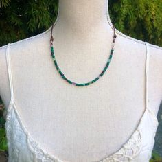 Handmade dainty beaded necklace with leather has a hand forged sterling hook clasp and Thai silver tube beads.  3mm Malachite with sprinkles of Garnet, Prehnite, Apatite, and Amethyst gemstones.  Very versatile and can be worn in both casual or formal way. Ready to ship, beautifully wrapped for gift giving. I am happy to write a personal message if sending directly to the recipient. Rachelle Montoya© all rights reserved copyright non-transferable with sale Artisan Adjustable Hand Wrapped Beaded Necklaces, Everyday Bohemian Single Strand Jewelry, Green Bohemian Jewelry With Waxed Cord, Adjustable Artisan Beaded Necklaces, Bohemian Single Strand Beaded Necklaces For Everyday, Bohemian Waxed Cord Beaded Jewelry, Minimalist Adjustable Beaded Necklaces For Festivals, Adjustable Earthy Necklace For Everyday Wear, Beaded Bohemian Necklaces